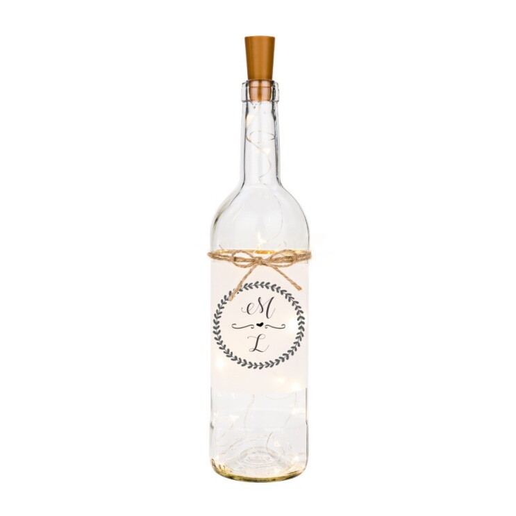 Eine durchsichtige Flasche mit Korken ist auf dem Bild zu sehen.