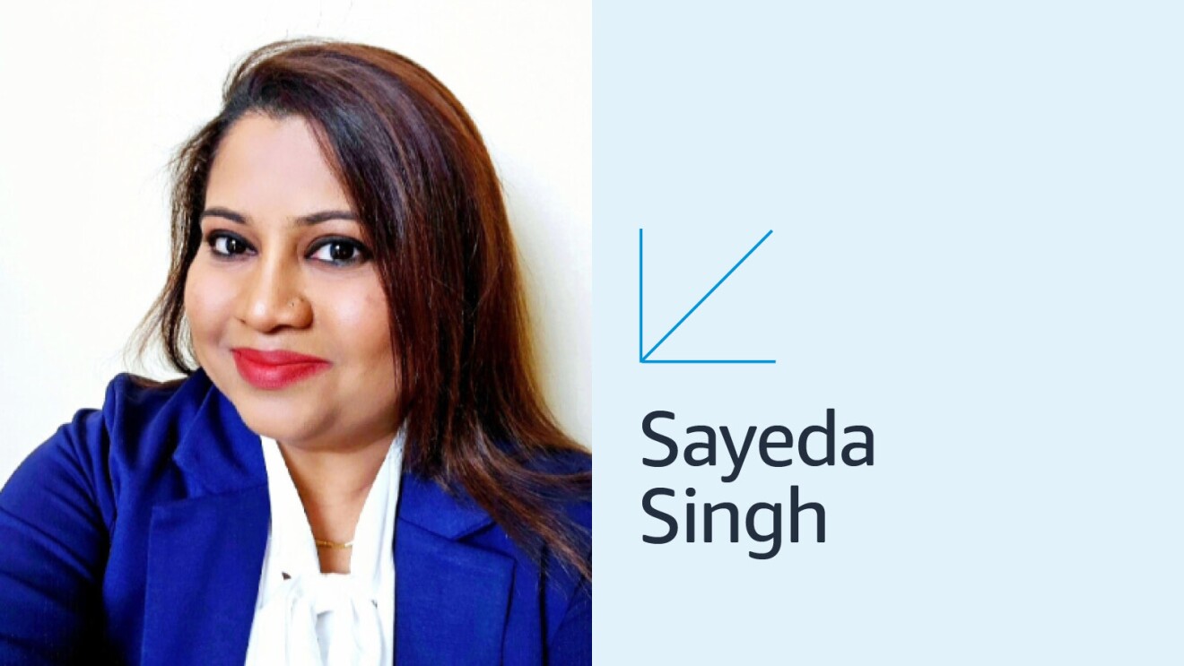 headshot of sayeda singh wearing a blue blazer