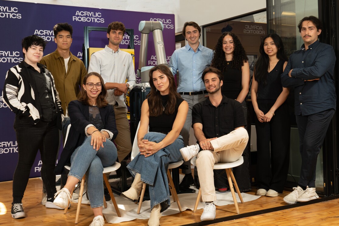 Acrylic Robotics team posing for a photo