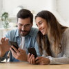 two people looking at a phone