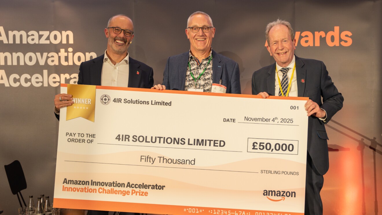 4IR Solutions, winners of Amazon Innovation Accelerator, holding £50,000 prize check