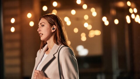 Picture of woman wearing echo buds