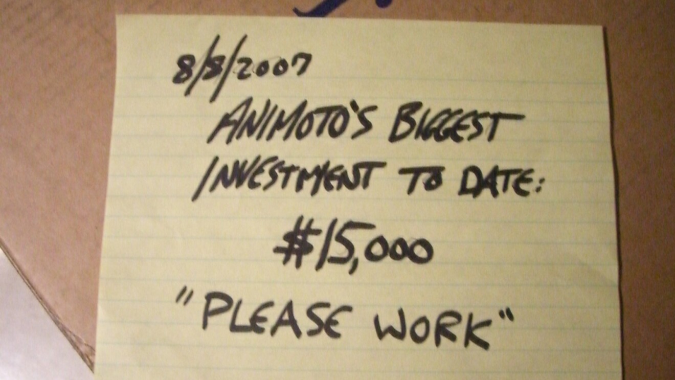 An image of a sticky note that has the date "8/8/2007" on it and says "Animoto's Biggest investment to date: $15,000 'please work'"