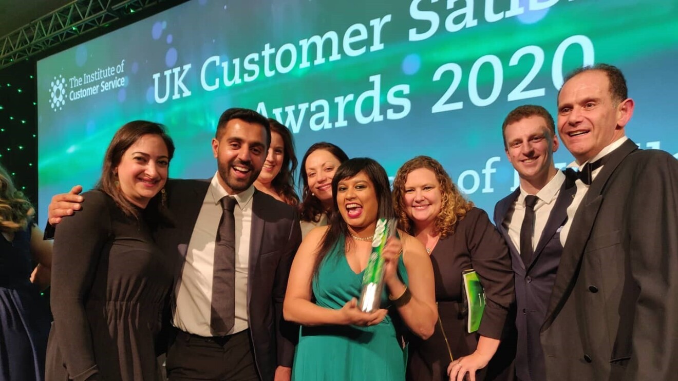 Amazon employees collecting best customer service of the decade award