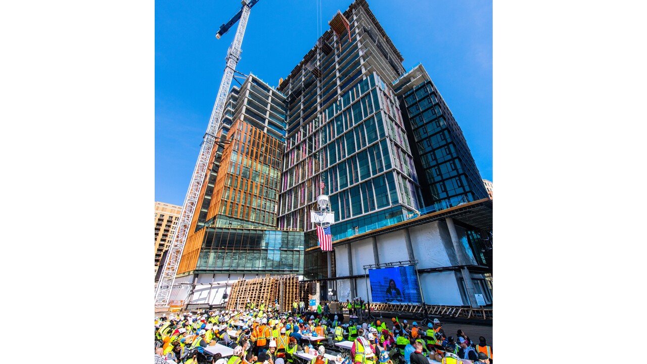 An image of the "top out" event celebration for Amazons HQ2's Met Park.