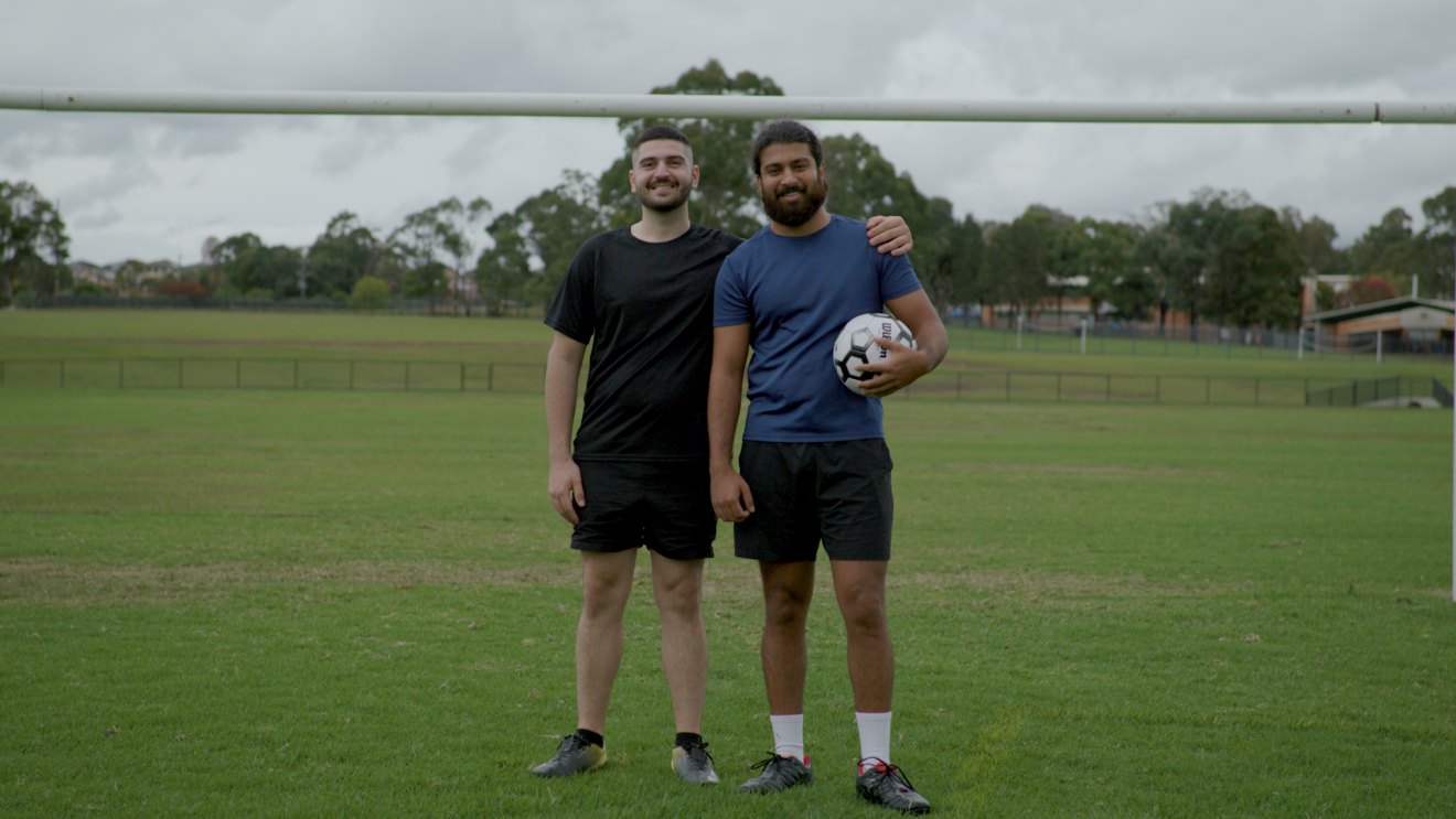 Sergen and a friend playing soccer together.
