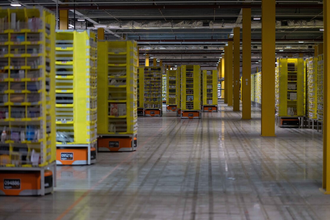 Robots working in the stow area of a fulfilment centre