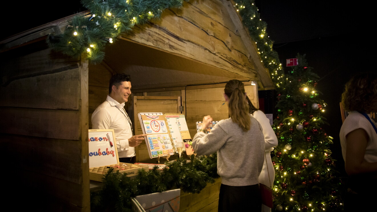 Attendees at Amazon's Christmas market