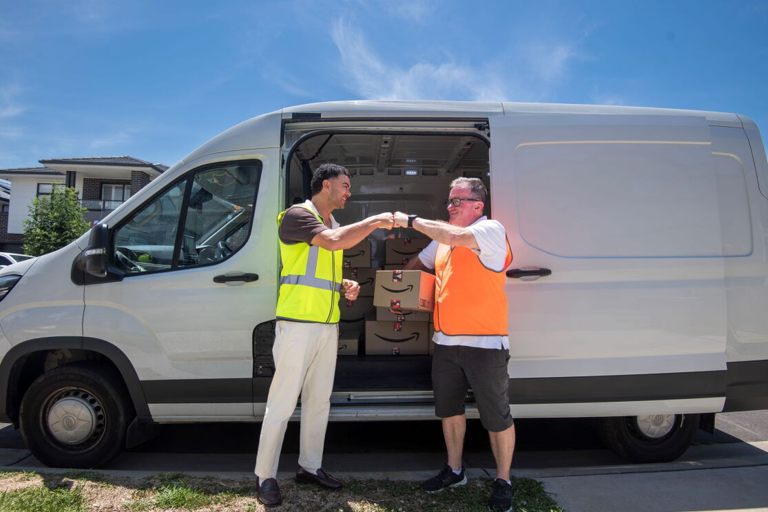 Guy and Brendan McEntee in front Amazon Flex van