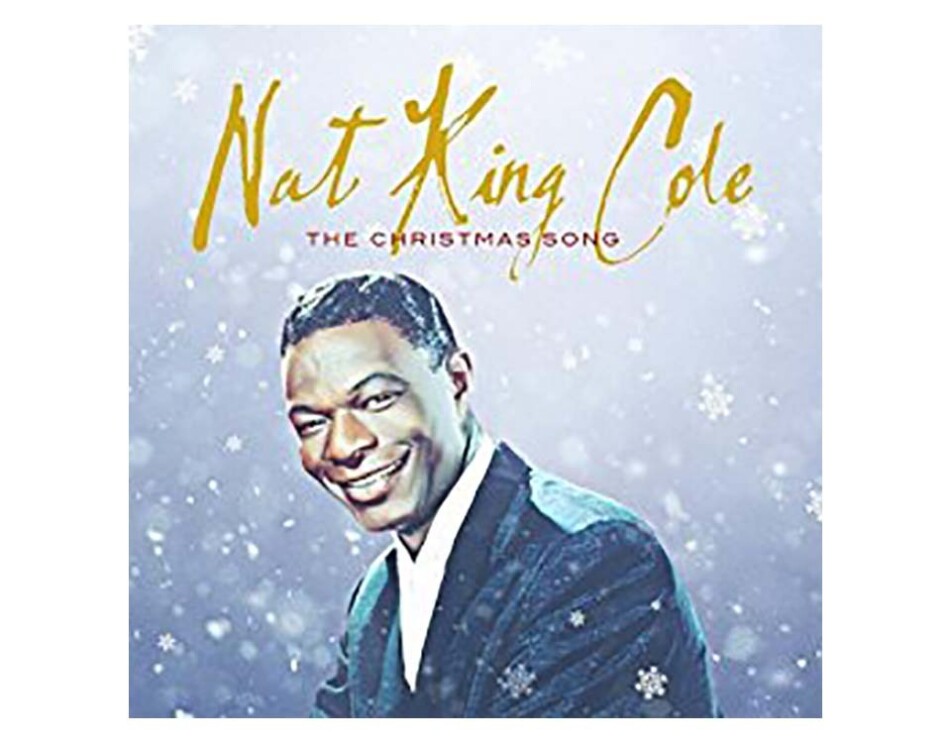 Nat King Cole wears a suit, facing the camera with a smile. The background is a blue-gray and appears to fade from light to darker gray-purple. Snow falls around him, with snowflakes in front of him. Nat King Cole is scrawled across the top in gold, with "The Christmas Song" in red, below.