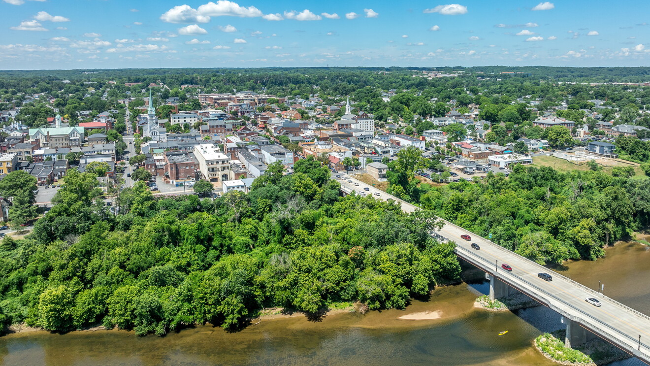 Aerial view Fredericksburg, Virginia with historic business district, Chatham bridge over Rappahannock River