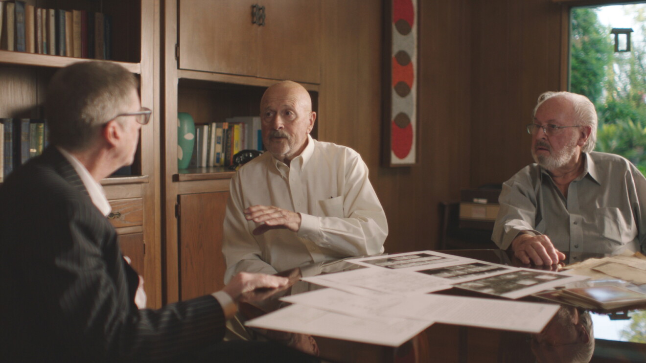 The Hillside Strangler: Business meeting between older gentlemen in home office