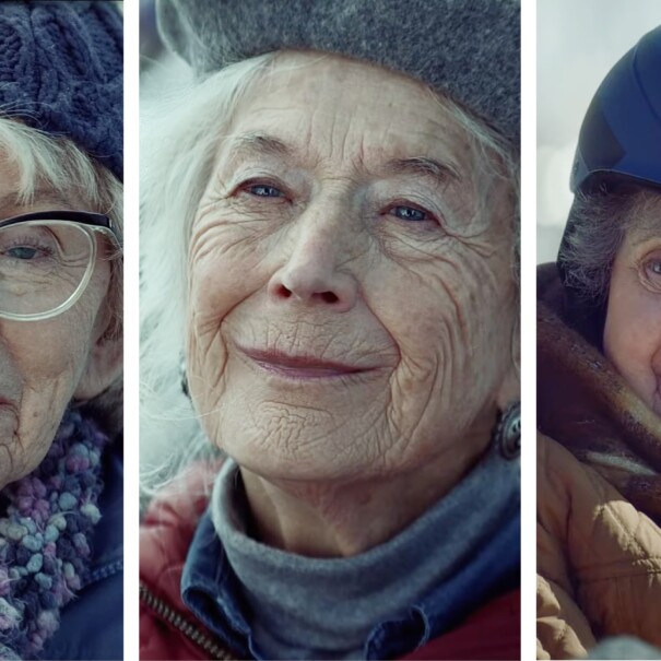 Elderly woman in winter gear with glasses and knit hat
