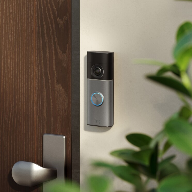 Amazon Ring doorbell next to a home's front door
