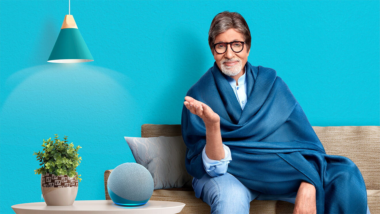 Amitabh Bachchan sitting on a sofa