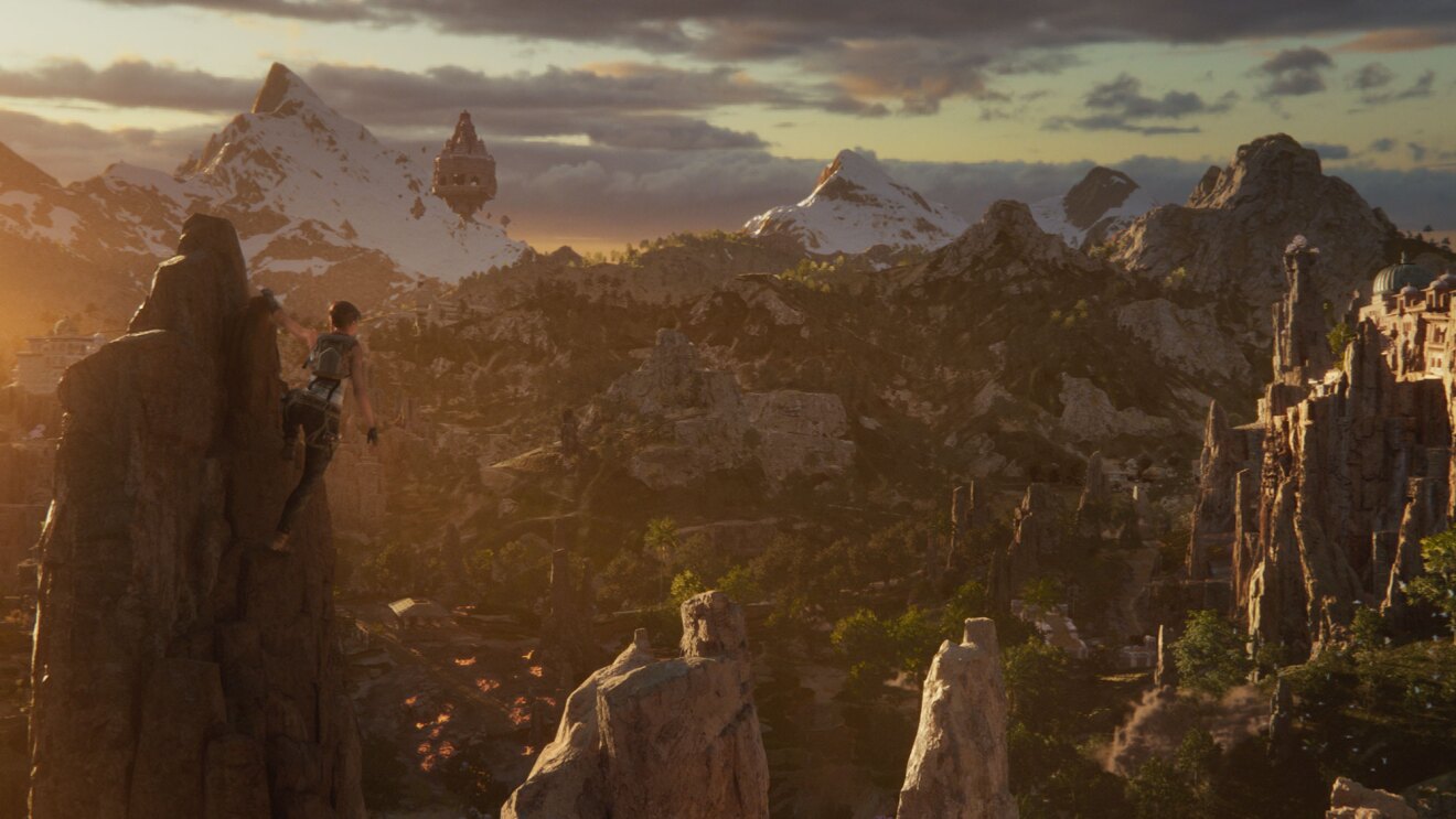 Adventurer scaling rocky cliff overlooking vast mountain landscape at sunset