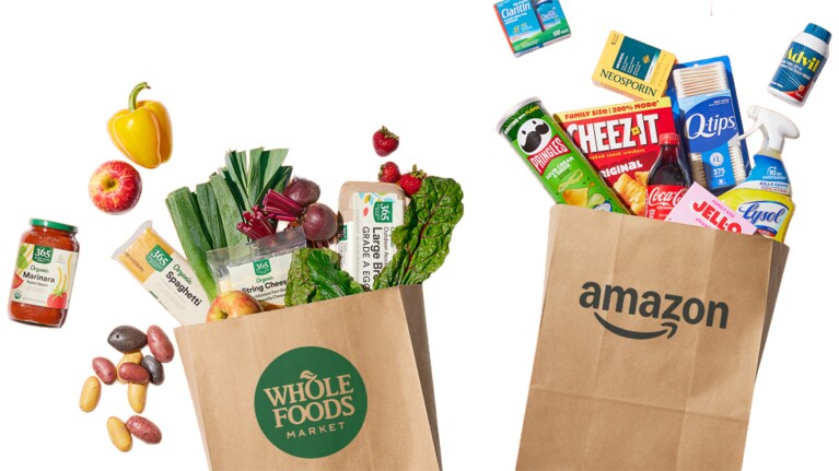 Grocery bags from Whole Foods and Amazon filled with fresh produce and packaged goods