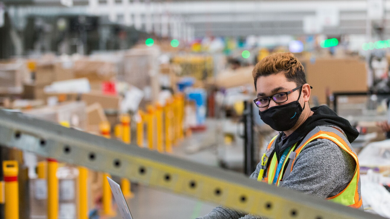 Amazon employee working at a fulfillment center in Australia. 