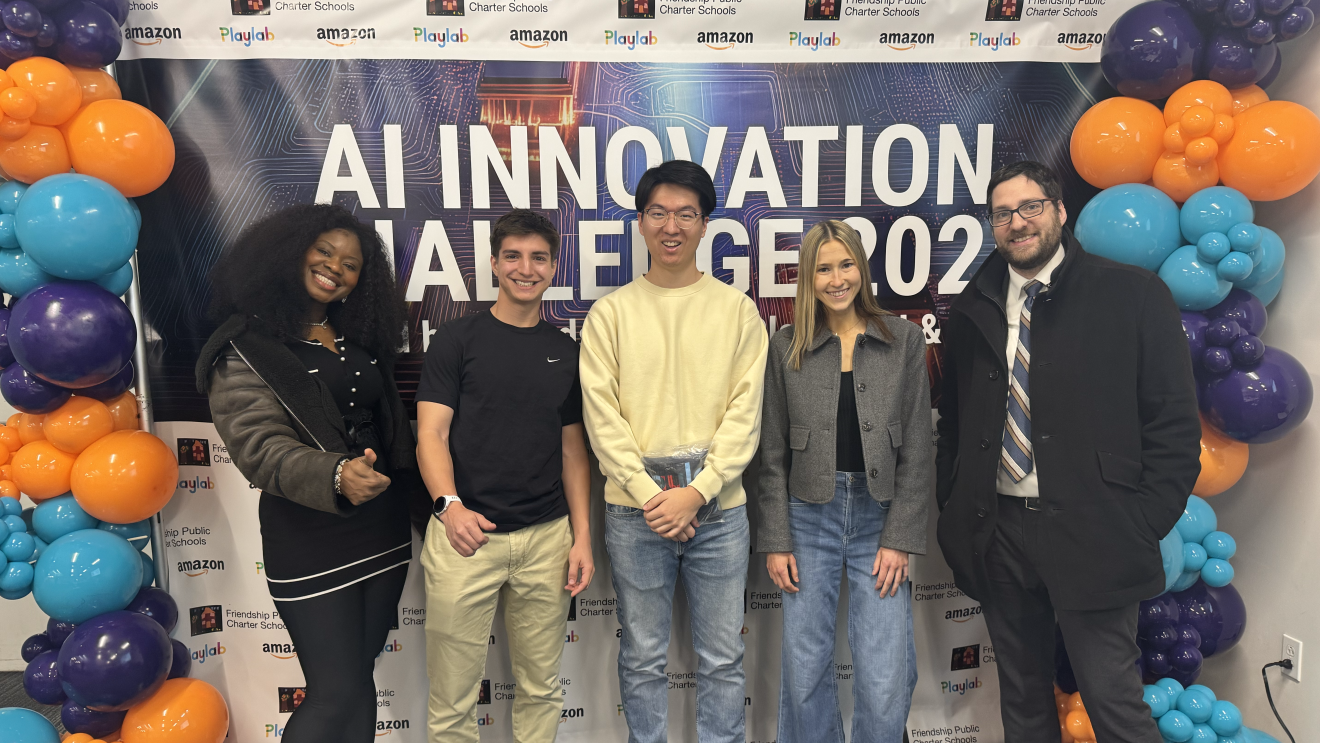young adults taking a photo at AI Innovation