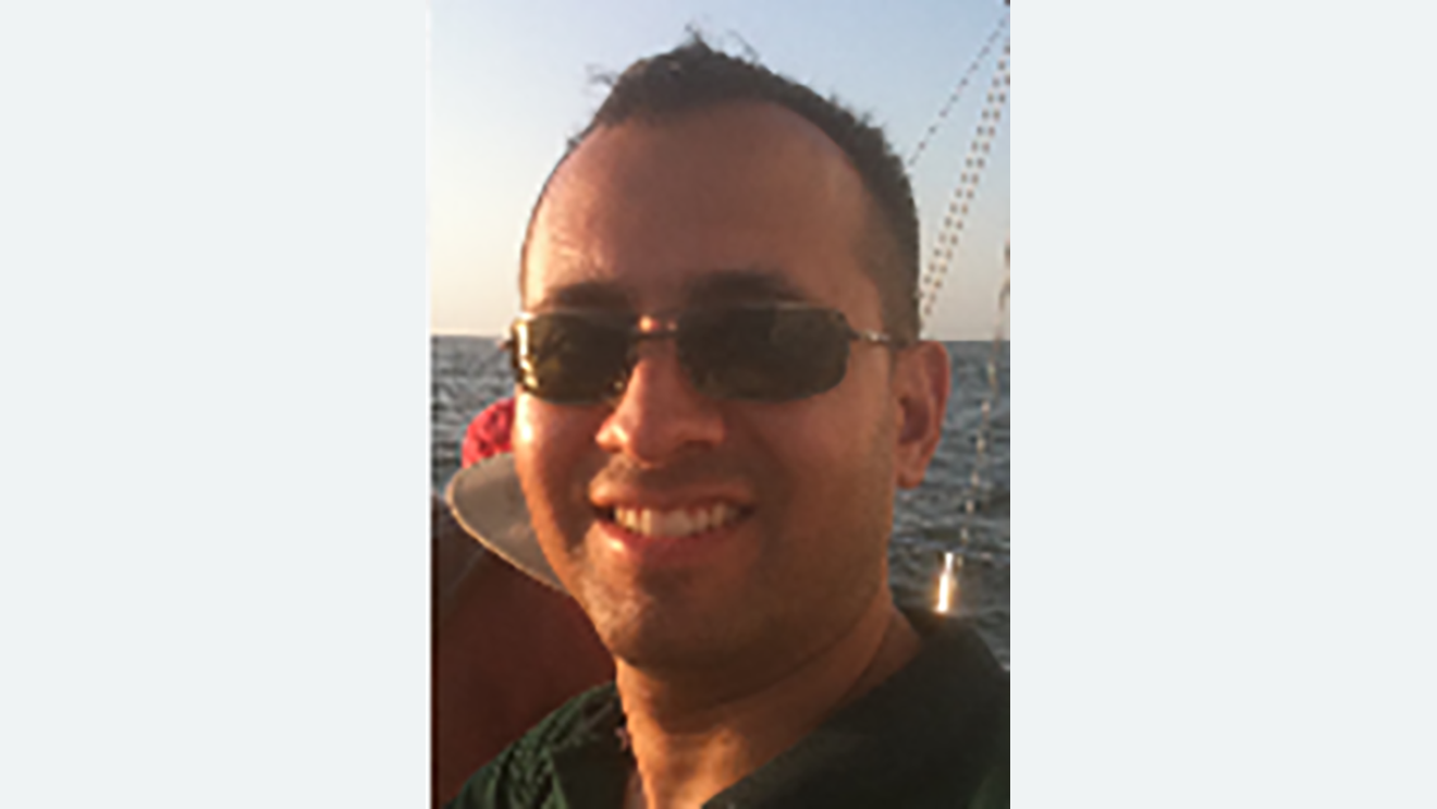 Headshot of a male Amazon employee