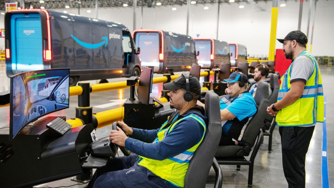 Delivery drivers going through a simulated training exercise at an Amazon Last Mile Driver Academy.