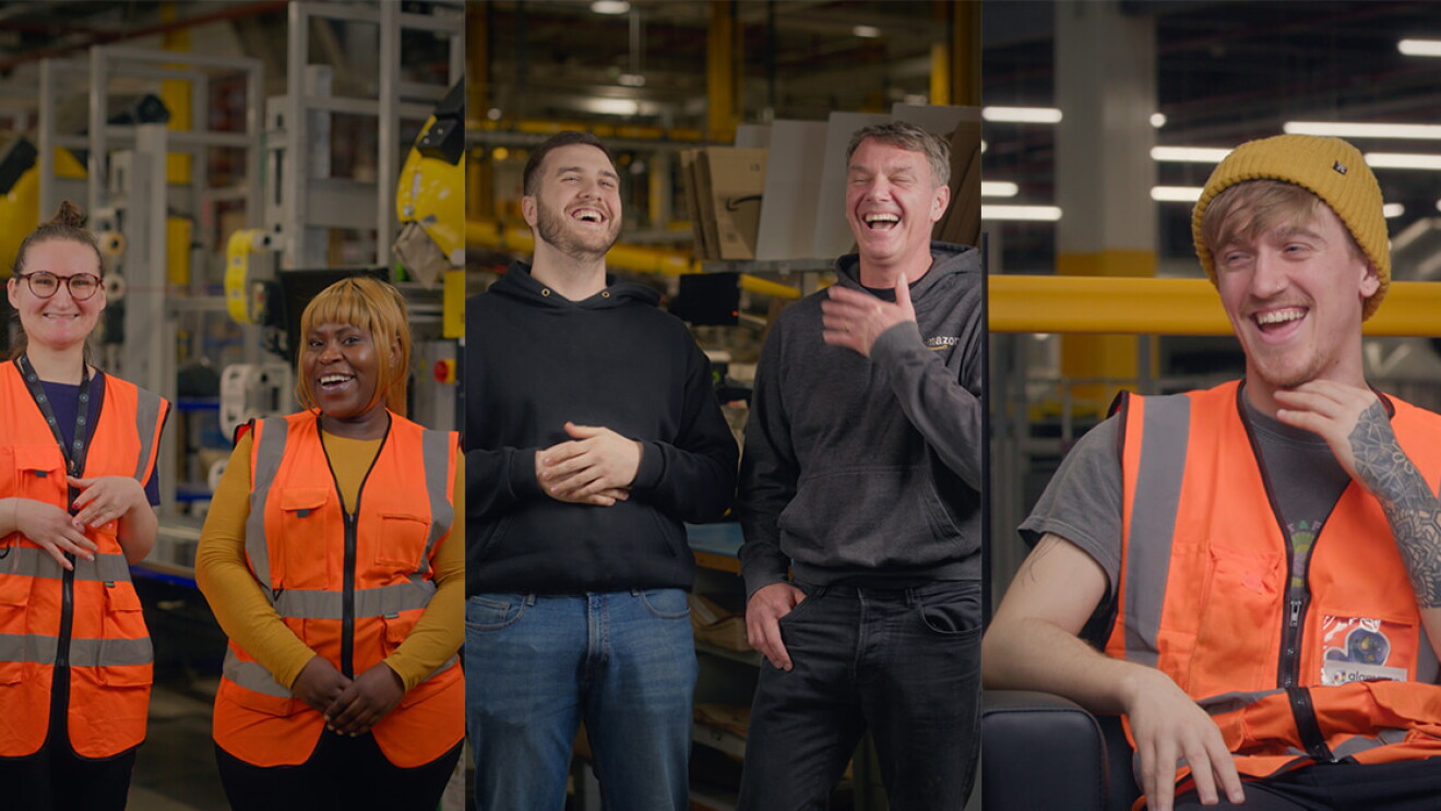 Five Amazon employees standing around a fulfilment centre 