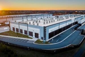 AWS data center with sunset in the background