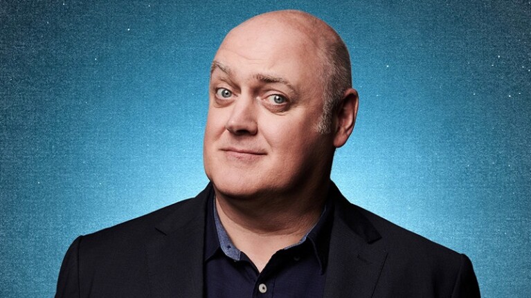 Headshot of man with raised eyebrows