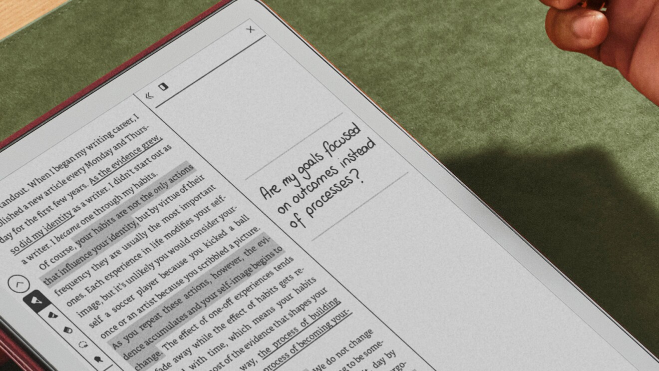 E-reader screen with text on forming habits and personal growth