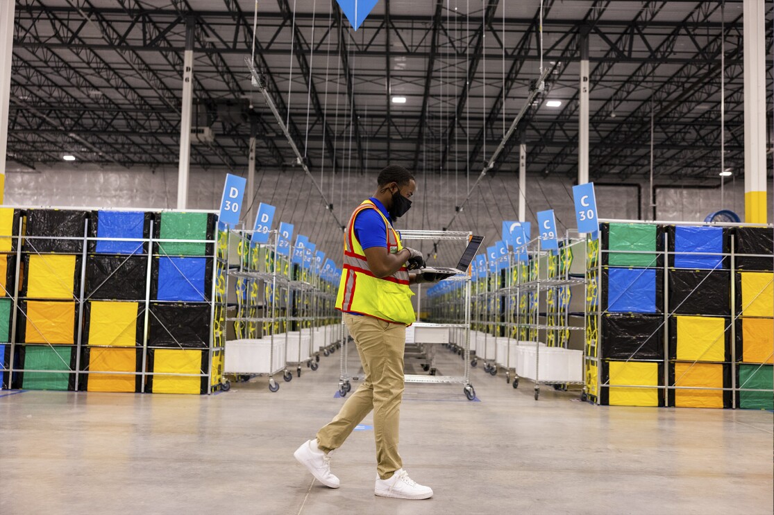 Juwan Page, an Amazon employee, at an Amazon Fulfillment Center