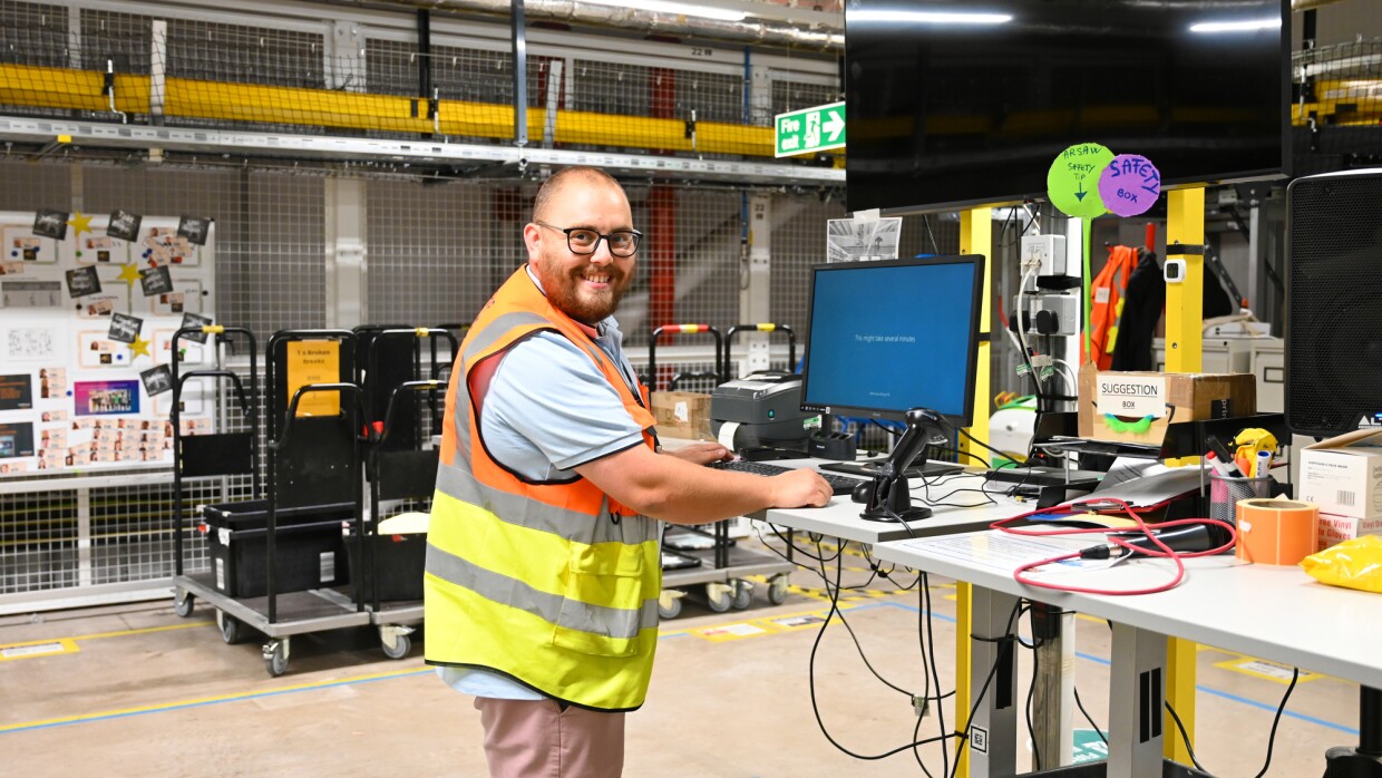 Peter Keay - Area Manager at BRS1 standing at his desk