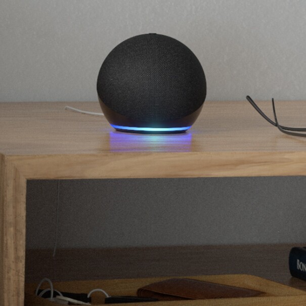 Echo device standing on the bed-side table