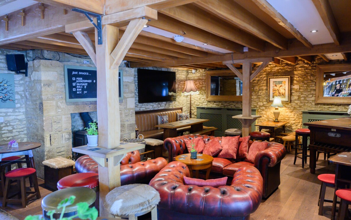 The cosy bar at The Farmer's Dog in Burford, Jeremy Clarkson's proper British pub from Clarkson's Farm season 4