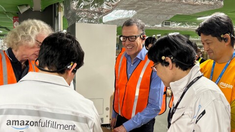 An image of Amazon Stores CEO, Doug Herrington, visiting Amazon employees in Japan.