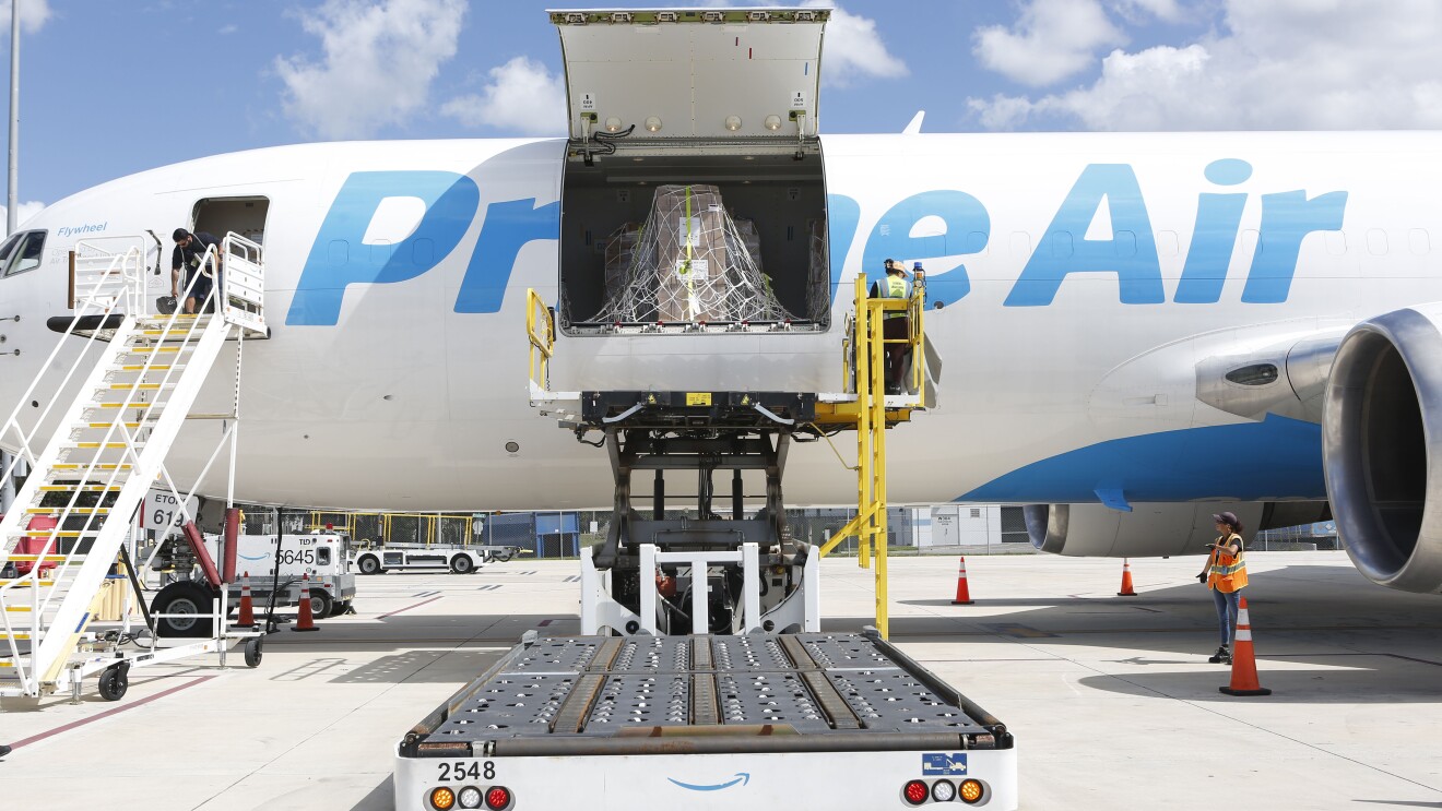 Cargo being loaded onto Prime Air plane with raised cargo door by DRbA for Hurricane Milton