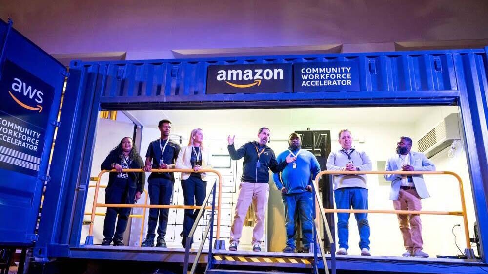 AWS community workforce accelerator with individuals standing and speaking
