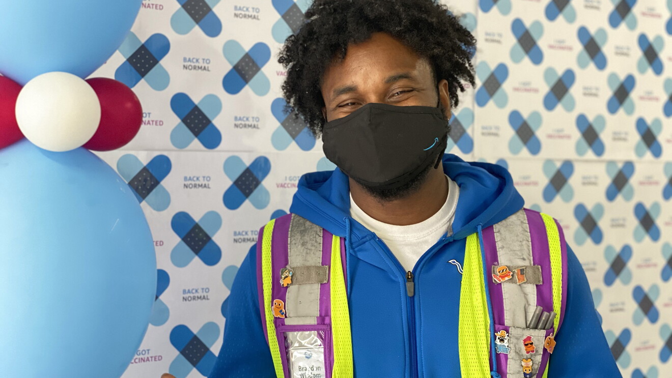 Amazon employee at a COVID-19 vaccination event