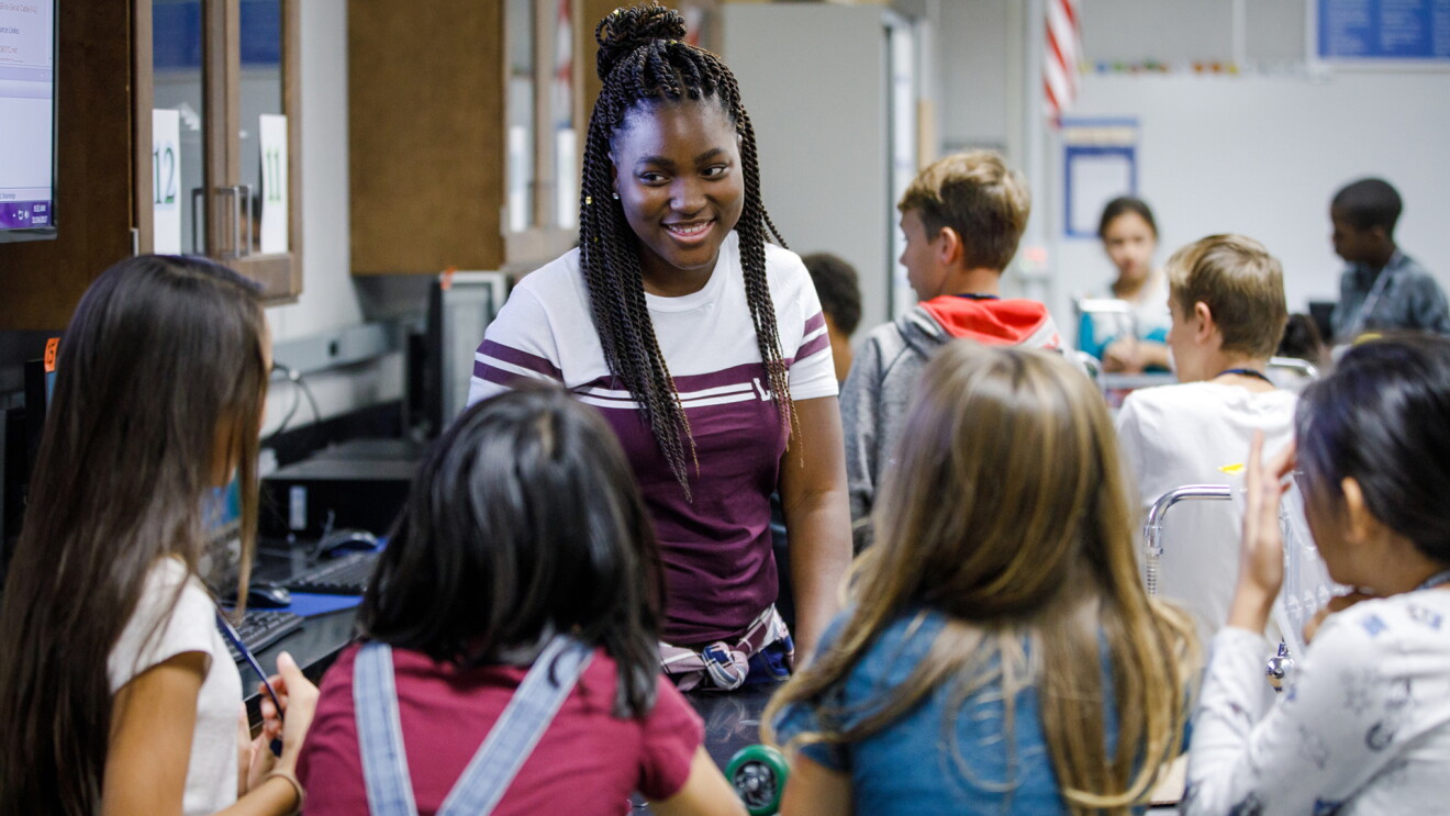High school student Niamani Knight visits a classroom