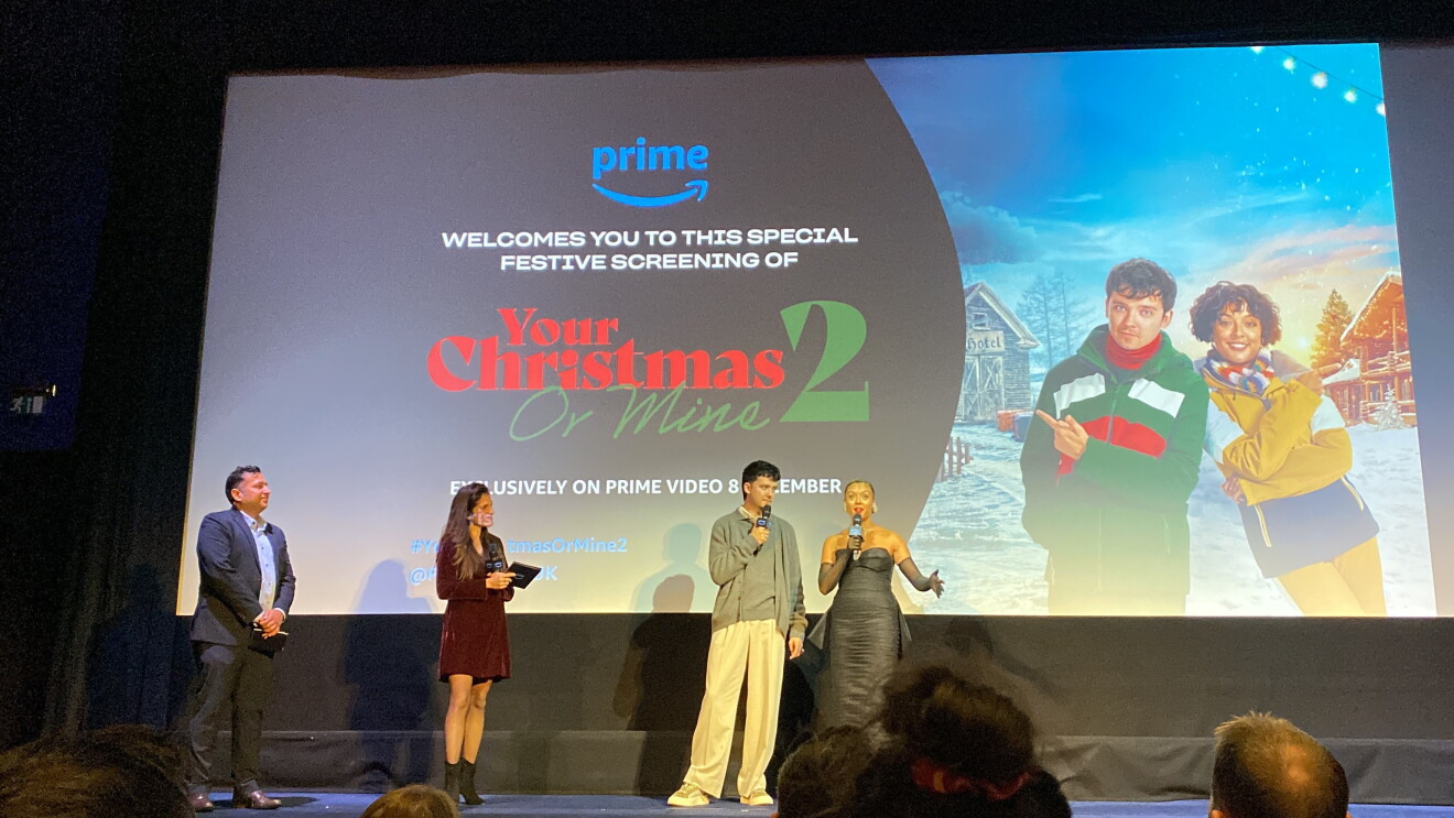 Asa and Cora on stage at the Your Christmas or Mine 2 screening