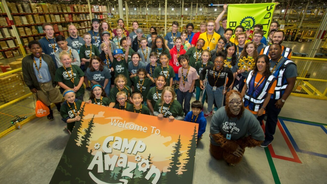 Students participate in a Camp Amazon event at a fulfillment center in Washington