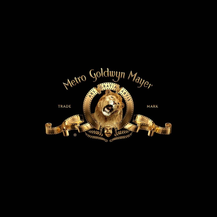 Trademarked logo for Metro Goldwyn Mayer in gold, on black background