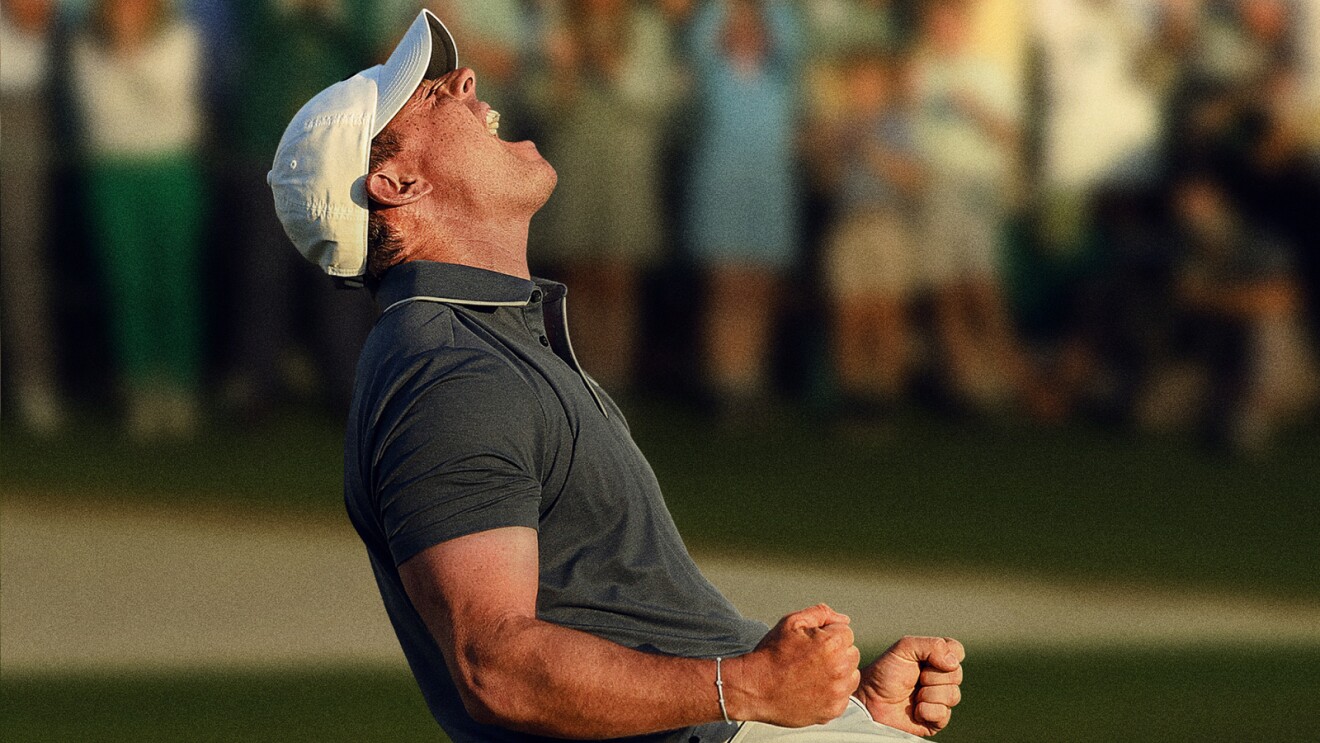Rory McIlroy celebrates winning the 2025 Masters in Augusta, clenching fists and shouting to the sky.