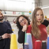 L'imprenditore leonardo Dondini nel maglificio di famiglia insieme ad un'impiegata, provando un capo di cashmere su una modella