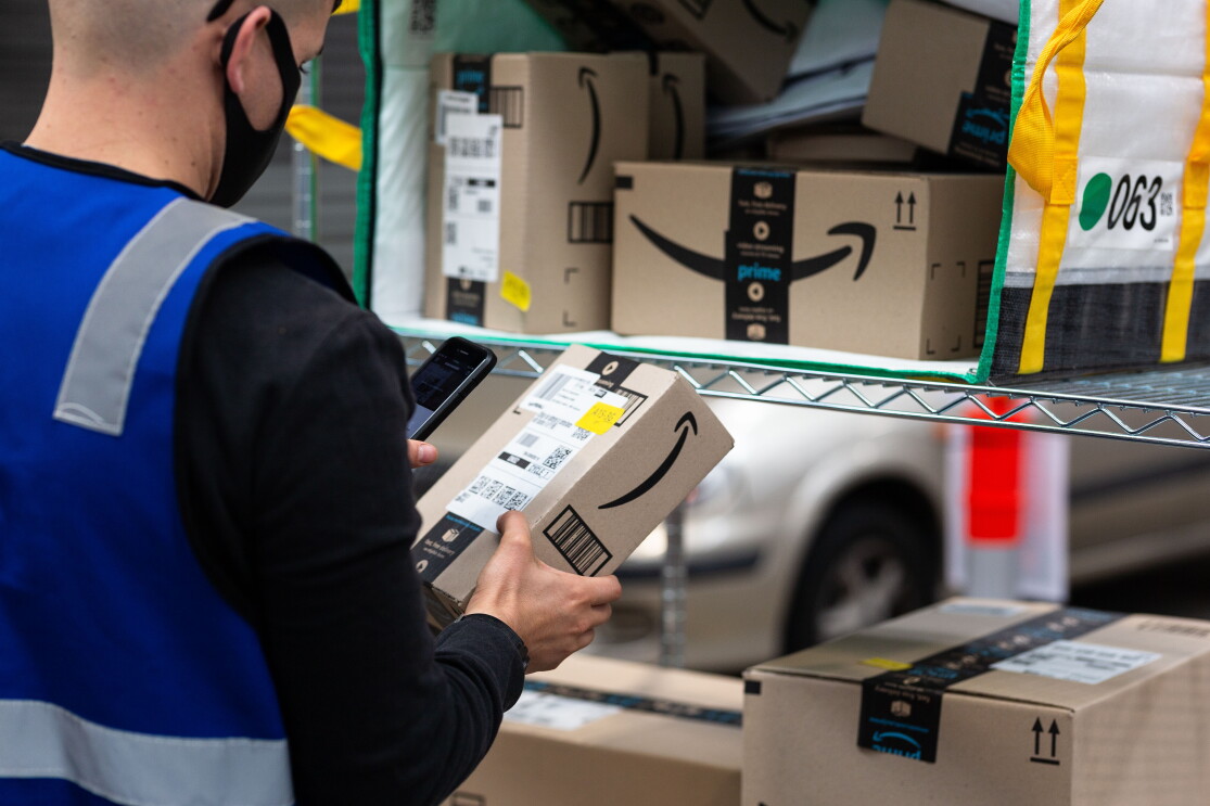 Delivery partners pick up packages from the delivery station and deliver them to customers