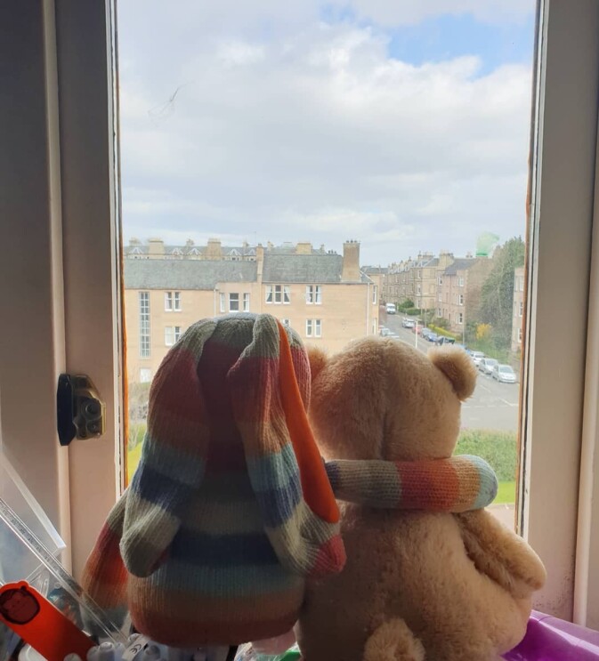 Rainbows displayed in windows, created by children, as a means to thank essential workers during the COVID-19 pandemic