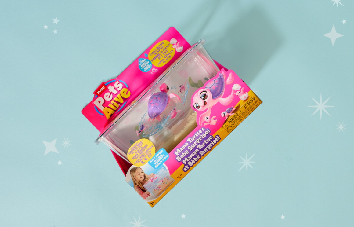 Pets Alive toy in pink packaging with animated character