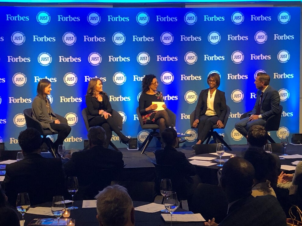 A panel at the JUST Capital awards dinner, featuring Amazon's Ardine WIlliams, alongside four other individuals.