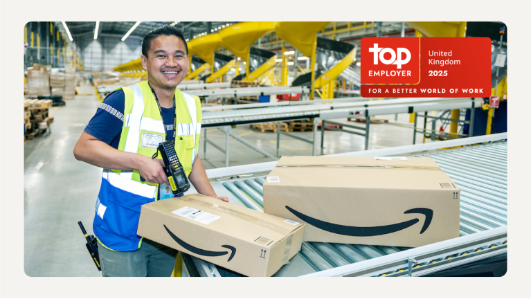 A smiling Amazon worker scans an Amazon package, and the Top Employer UK 2025 badge appears in the top right hand corner of the image