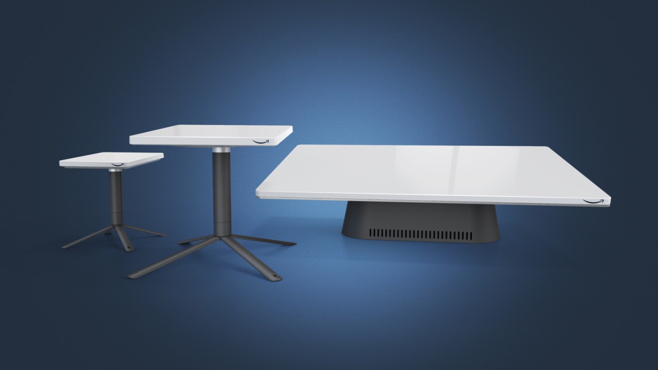 Three modern white Amazon Leo satellite transmitters with varying sizes