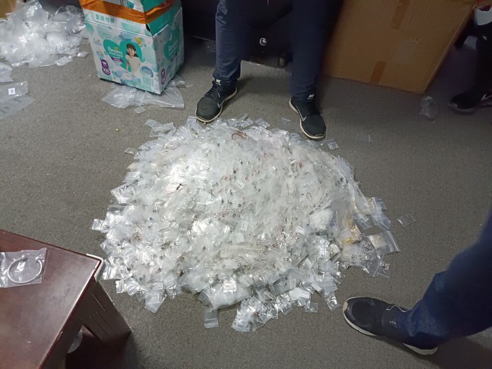 Large pile of discarded plastic packaging on floor